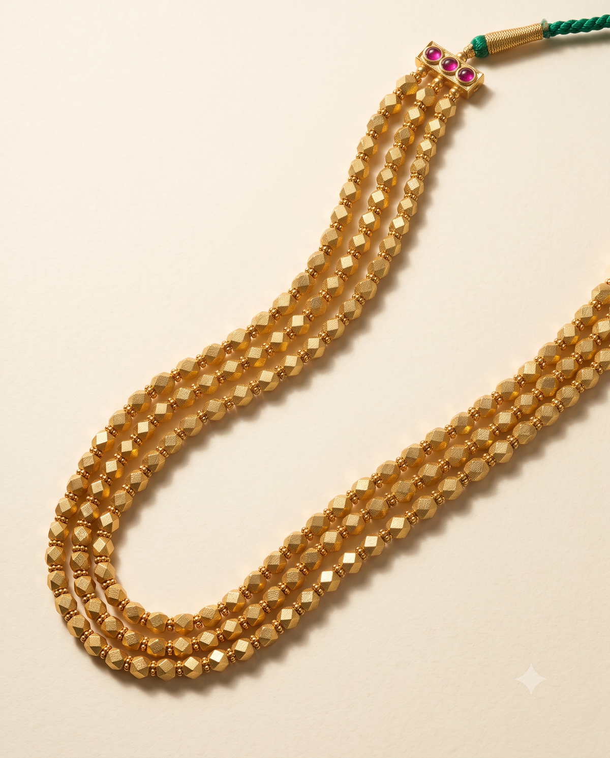 Golden Triveni Mala
